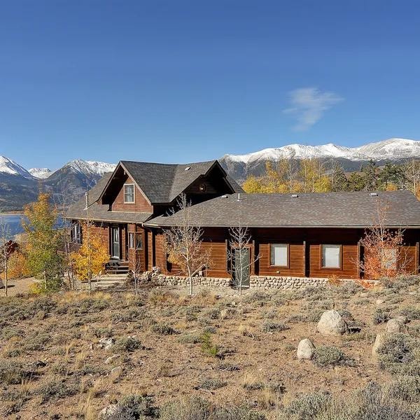 Black Bear Lodge mountain cabin with snowy Colorado peaks