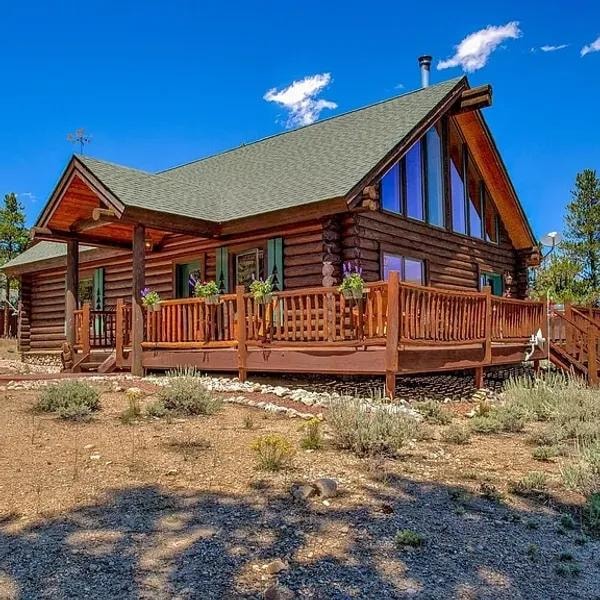 R-Kansas Getaway rustic log cabin with wraparound deck
